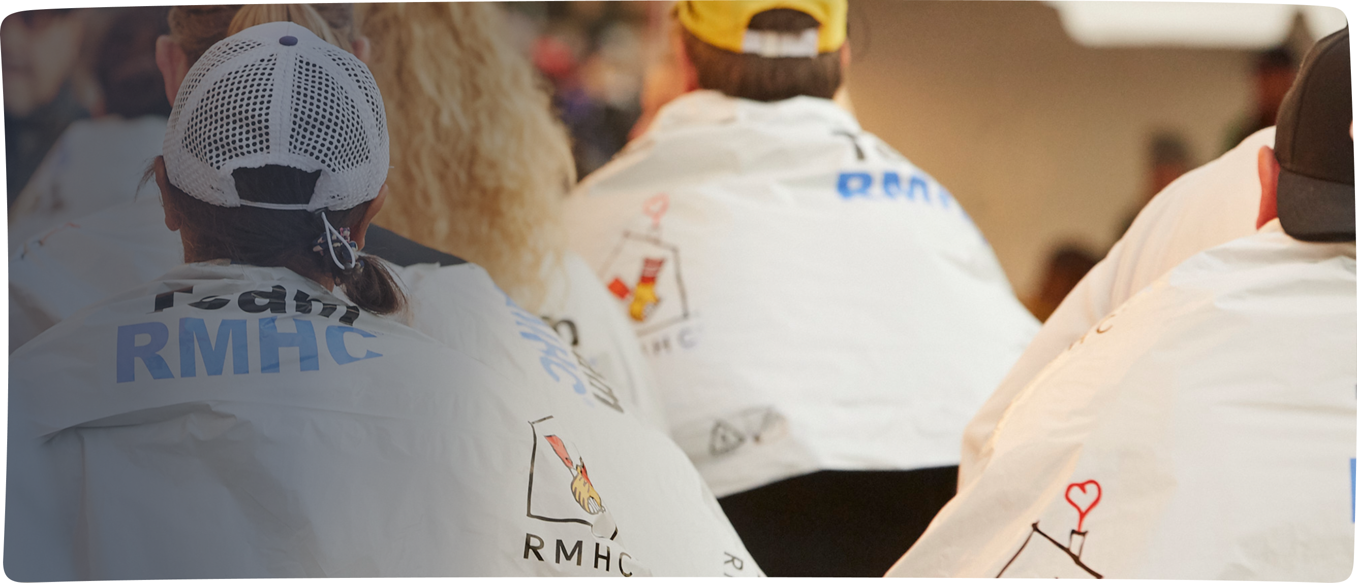 Team RMHC marathoners from the back wrapped in space blankets